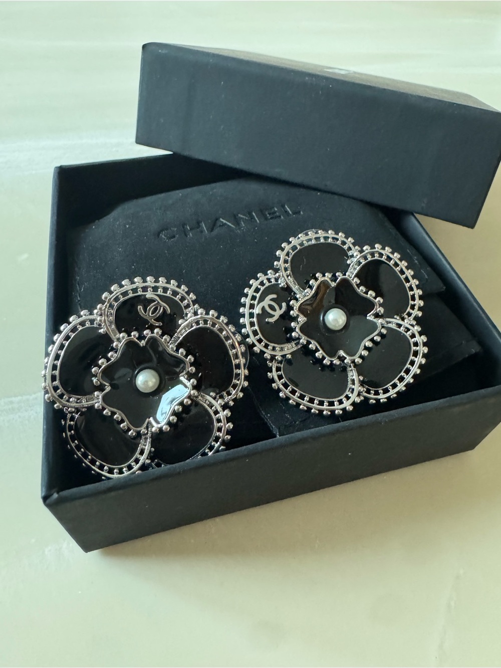 CHANEL Black Enamel Camellia Pearl Center Earrings